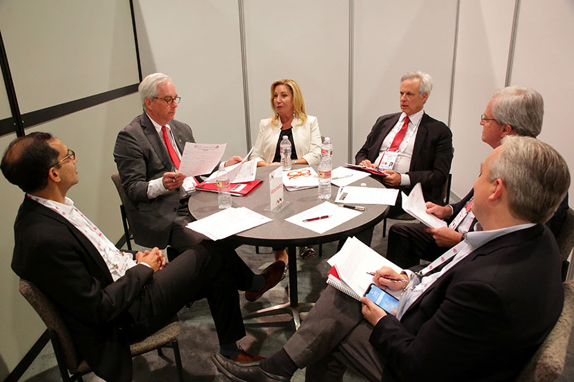 Judges discussing at 2018 Retail Real Estate Case Competition