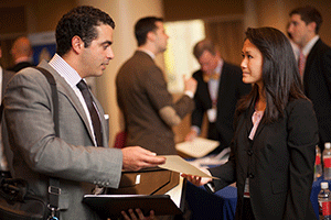 Student talking with a job recruiter.