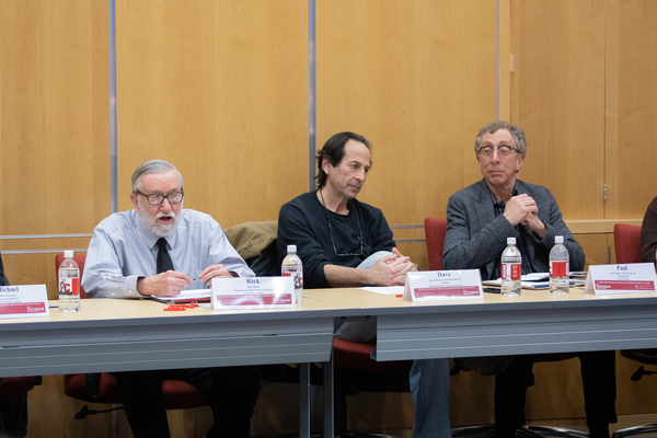 Professors in a roundtable discussion.