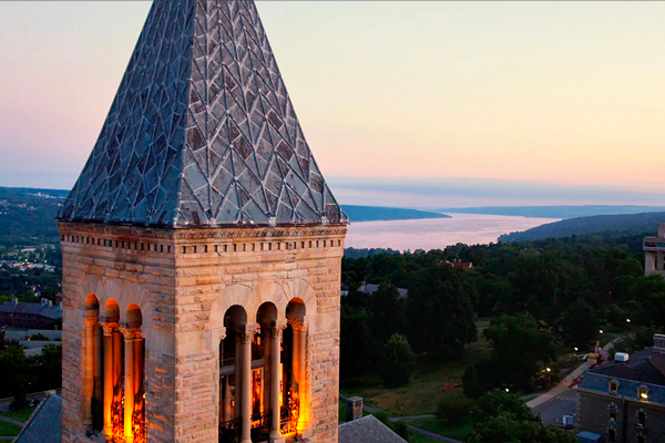 mcgraw tower with aerial view of campus and lake