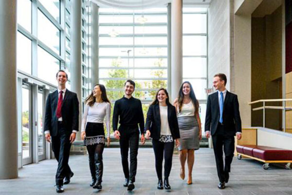 Students walking in formal business attire