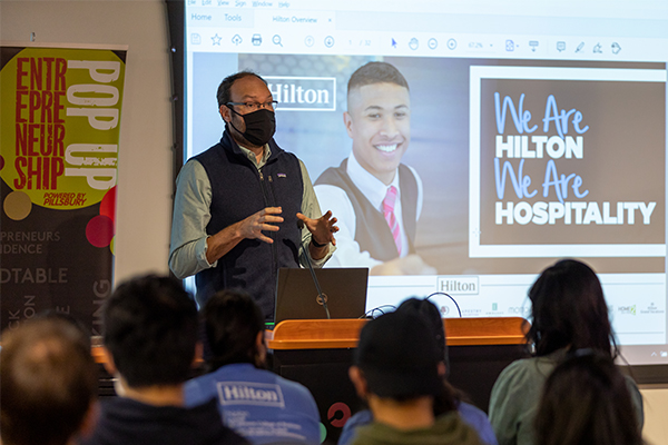 Hilton exec speaks to students about hackathon goals